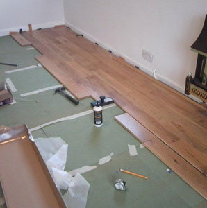laying new wooden flooring